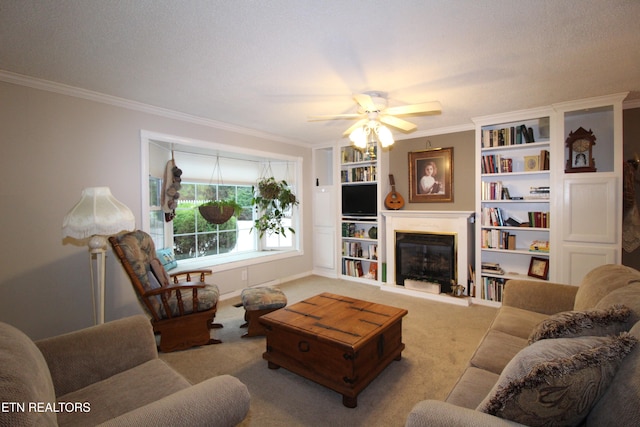 carpeted living room with a textured ceiling, ceiling fan, and ornamental molding