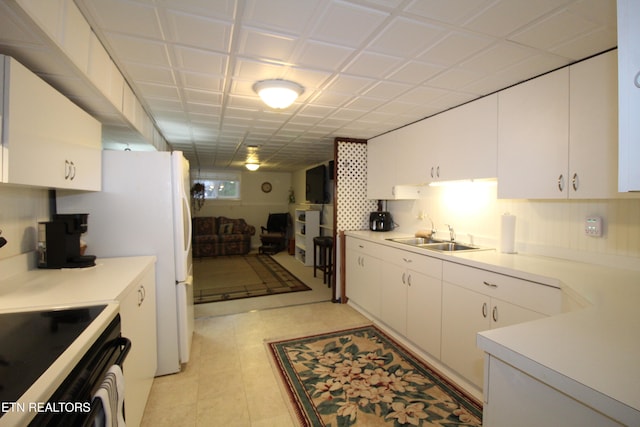 kitchen with white cabinets and sink