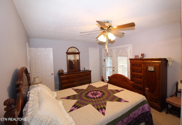 carpeted bedroom featuring ceiling fan