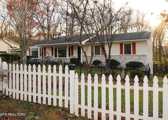 ranch-style house featuring covered porch