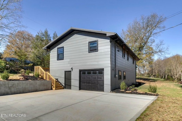 view of home's exterior with a garage