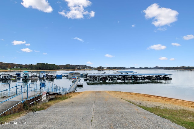 view of dock with a water view