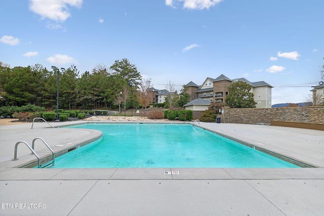 view of pool with a patio area