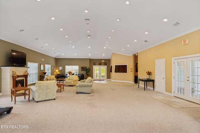 living room with light carpet, french doors, high vaulted ceiling, and crown molding