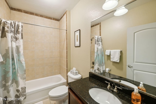 full bathroom featuring tile patterned flooring, vanity, shower / bath combination with curtain, and toilet