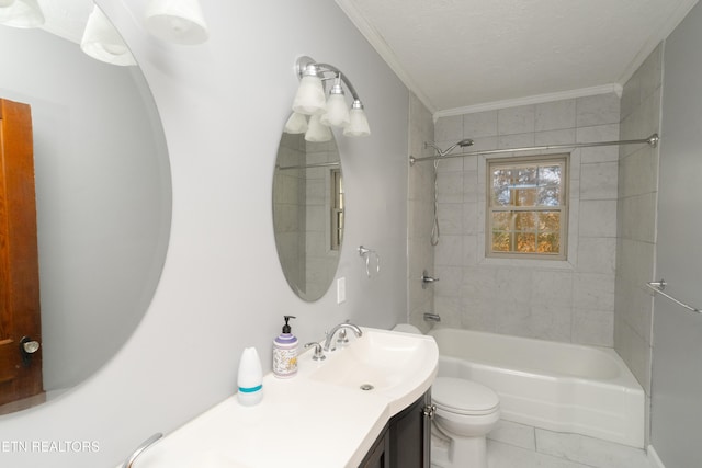 full bathroom featuring tiled shower / bath combo, crown molding, a textured ceiling, toilet, and vanity