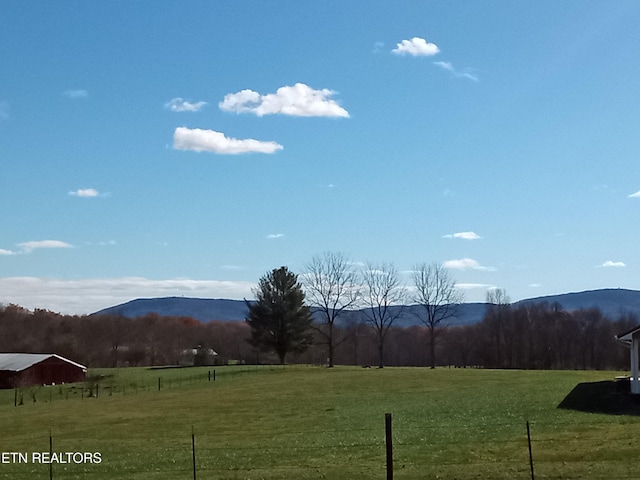 property view of mountains featuring a rural view