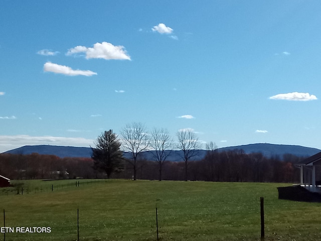 property view of mountains featuring a rural view