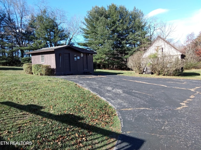 exterior space with a storage shed