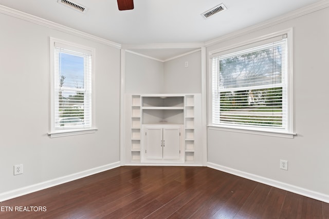 unfurnished living room featuring ceiling fan, hardwood / wood-style floors, and ornamental molding