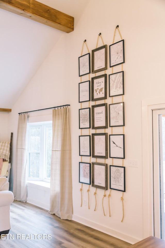 room details with hardwood / wood-style flooring and beamed ceiling