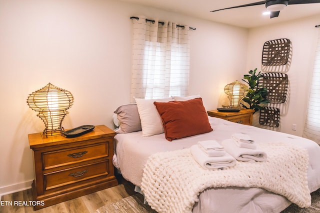 bedroom featuring ceiling fan and light wood-type flooring