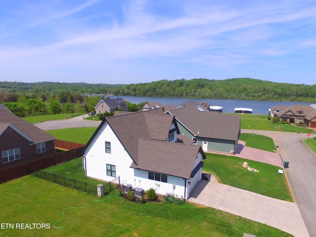 bird's eye view with a water view