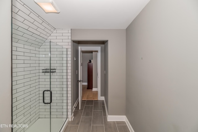 bathroom with an enclosed shower