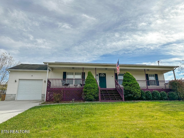 ranch-style home with a front yard, a porch, and a garage