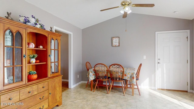 230 Clover Cir, Jacksboro, TN 37757 - dining space with vaulted ceiling, ceiling fan, and baseboards