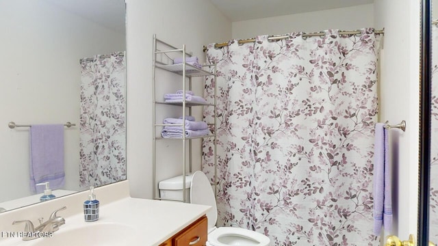 230 Clover Cir, Jacksboro, TN 37757 - bathroom with toilet, vanity, and a shower with curtain