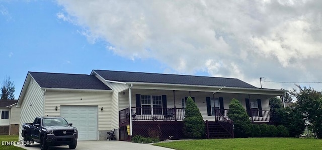 230 Clover Cir, Jacksboro, TN 37757 - ranch-style house featuring covered porch, an attached garage, a front yard, driveway, and stairs