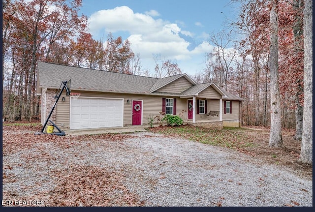 single story home featuring a garage