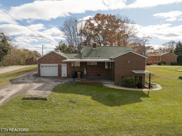 view of front facade with a front lawn and a garage