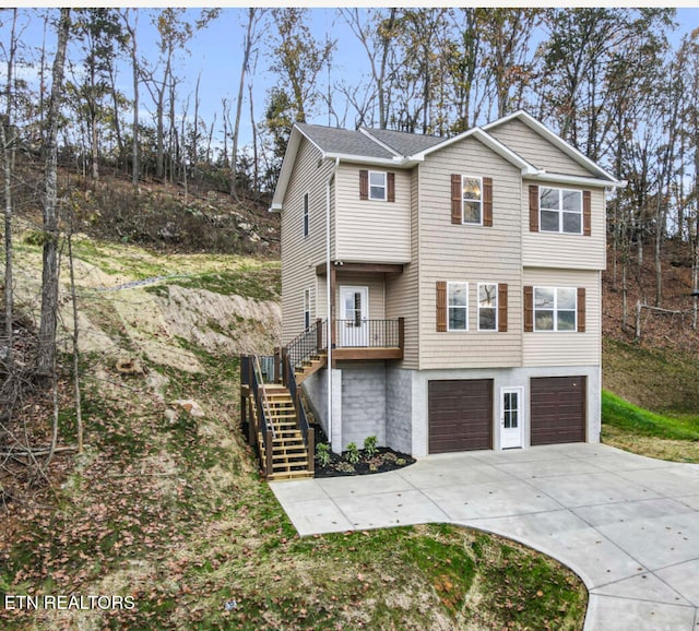 view of property exterior with a garage