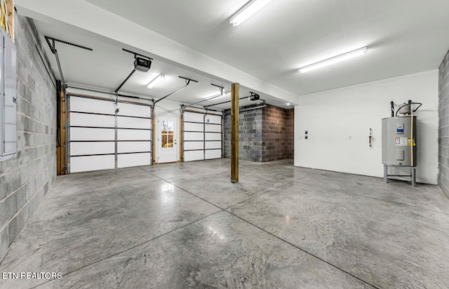 garage featuring electric water heater and a garage door opener