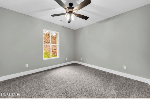 unfurnished room with carpet flooring and ceiling fan