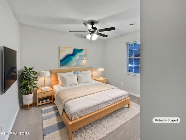 bedroom featuring carpet and ceiling fan