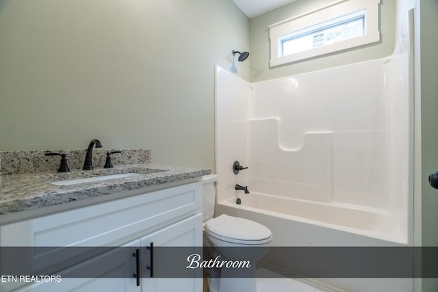 full bathroom with vanity, toilet, and shower / bathtub combination