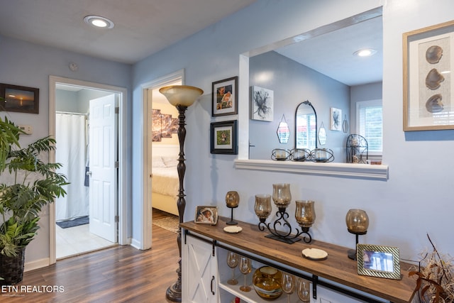 hallway with dark wood-type flooring