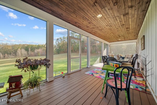 sunroom / solarium with wood ceiling