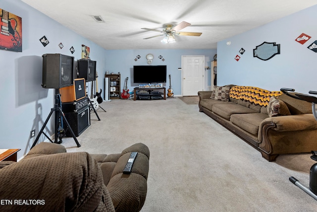 carpeted living room featuring ceiling fan