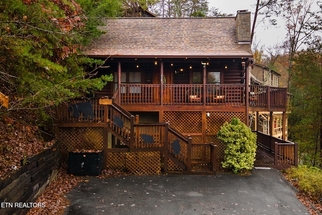 view of front of house with a deck