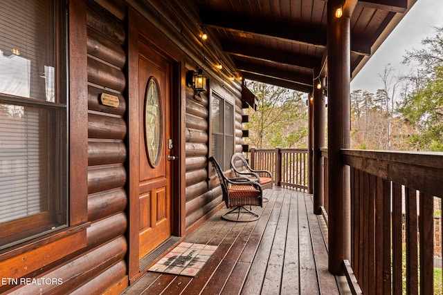 deck featuring covered porch