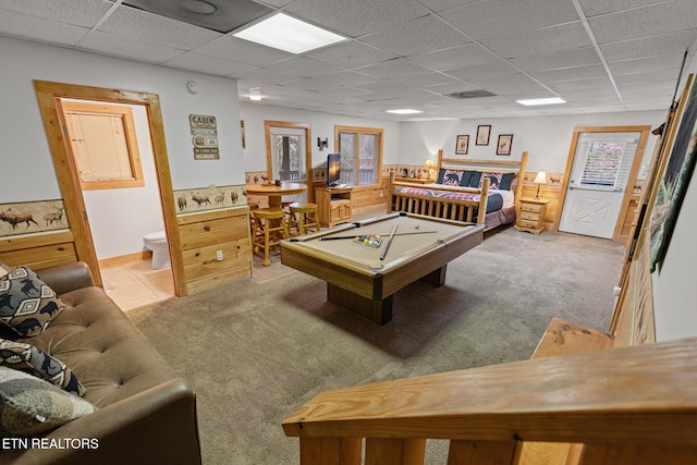 recreation room featuring light carpet, a drop ceiling, and pool table