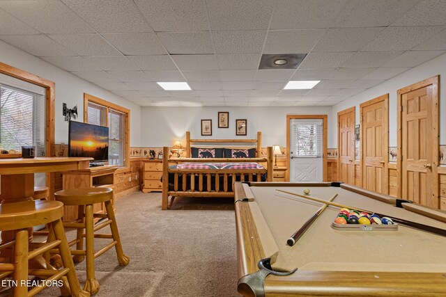 recreation room featuring carpet, a drop ceiling, a wealth of natural light, and billiards