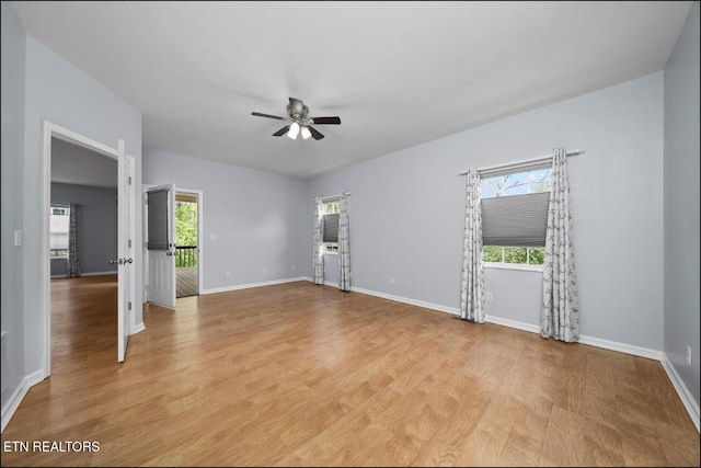 unfurnished room featuring light hardwood / wood-style flooring and ceiling fan