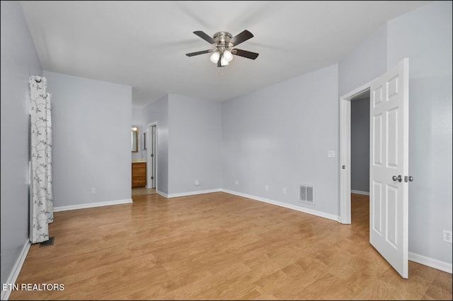 unfurnished bedroom with connected bathroom, ceiling fan, and light hardwood / wood-style floors