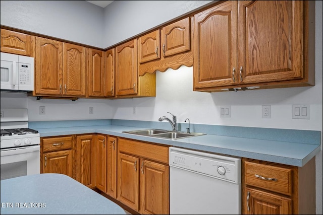 kitchen with white appliances and sink