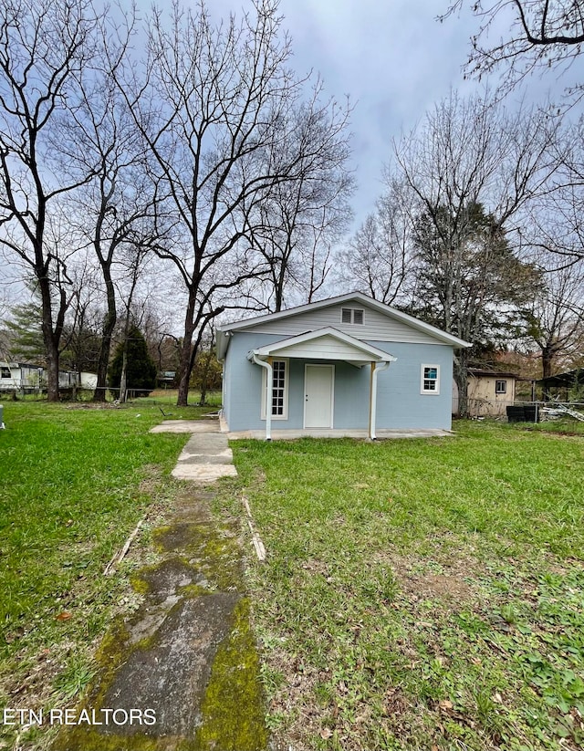 exterior space with a front yard