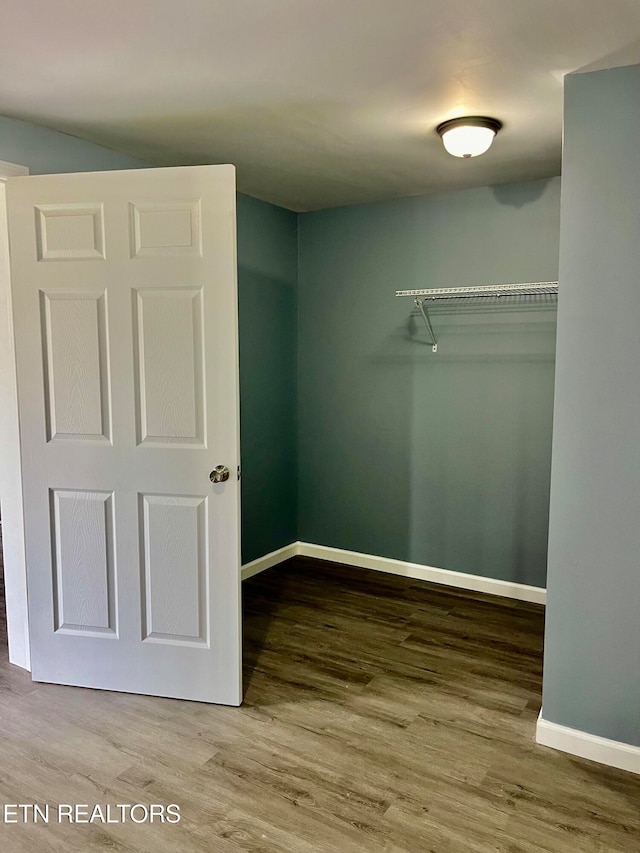 interior space with hardwood / wood-style flooring