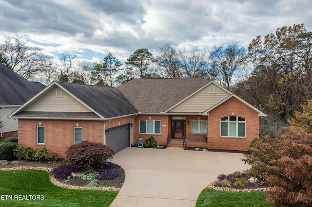 view of front of property with a garage