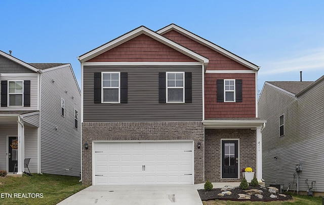 view of front of home with a garage