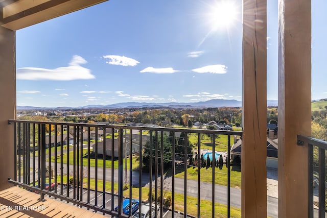 balcony featuring a mountain view