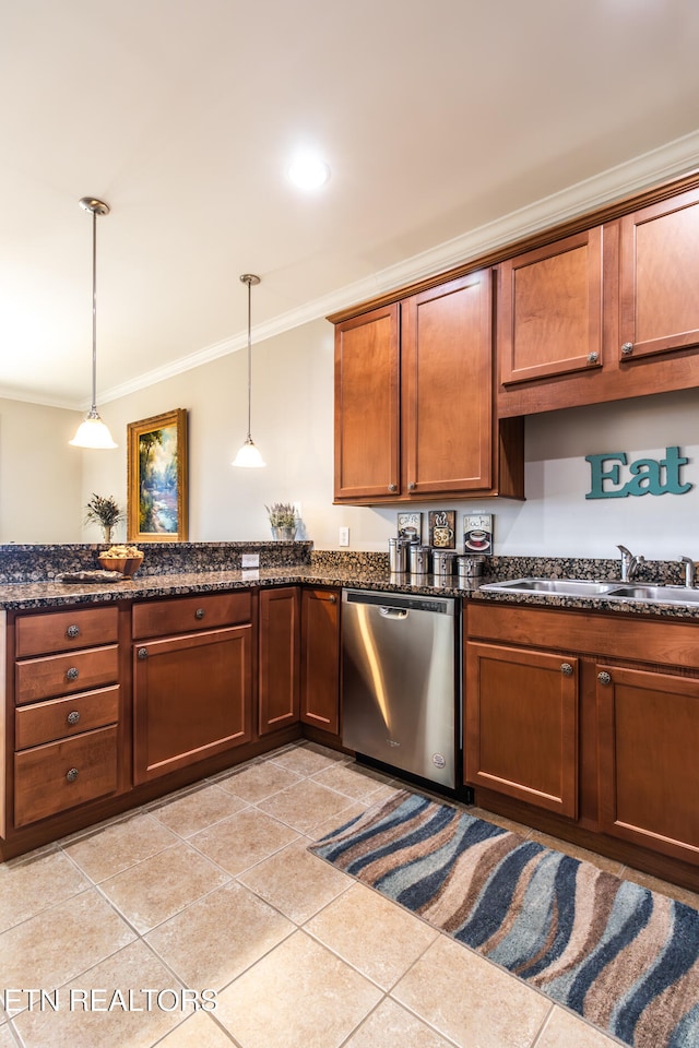 kitchen with dark stone counters, crown molding, hanging light fixtures, stainless steel dishwasher, and light tile patterned floors