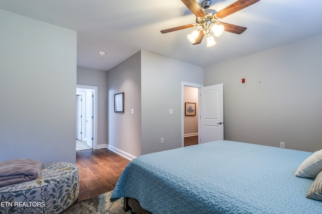 bedroom featuring ceiling fan and dark hardwood / wood-style floors