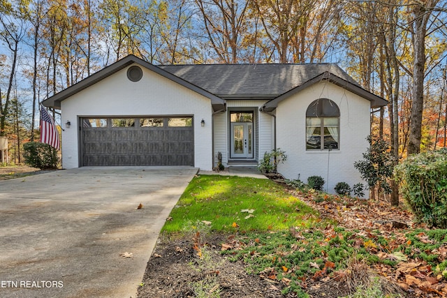 single story home featuring a garage