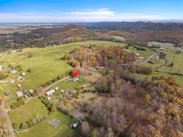 birds eye view of property featuring a rural view