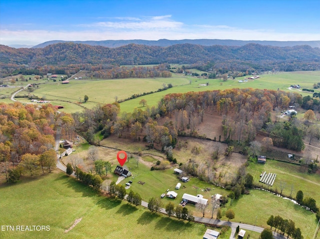 bird's eye view with a mountain view and a rural view