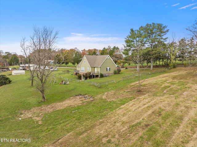 view of yard with a rural view